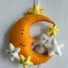 Baby Ellie on a Moon Name Hanging