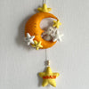 Baby Ellie on a Moon Name Hanging