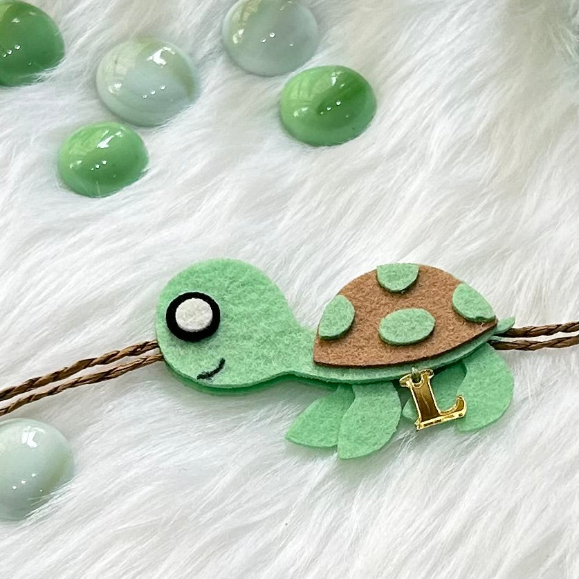 Handmade Felt Rakhi With Initials - Turtle Tie