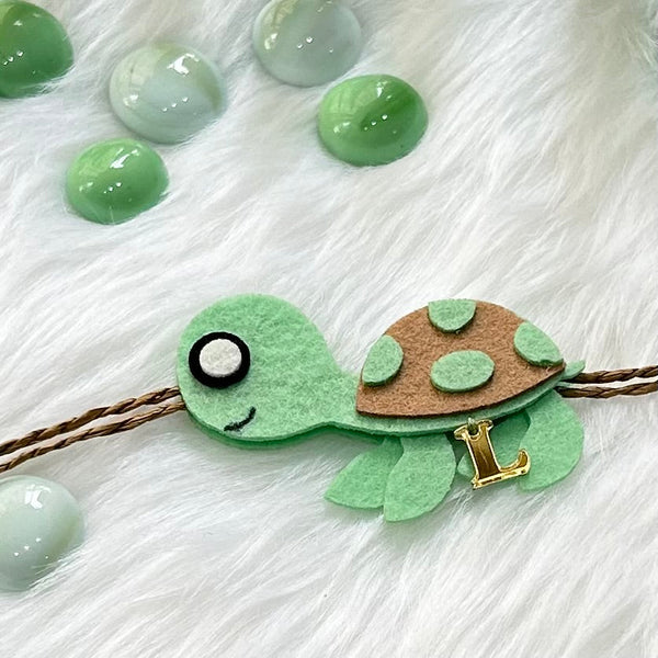 Handmade Felt Rakhi With Initials - Turtle Tie