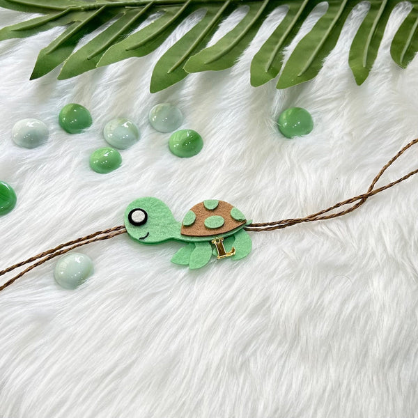 Handmade Felt Rakhi With Initials - Turtle Tie