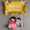 Siblings on swing  Customized Name Plate Wall Hanging